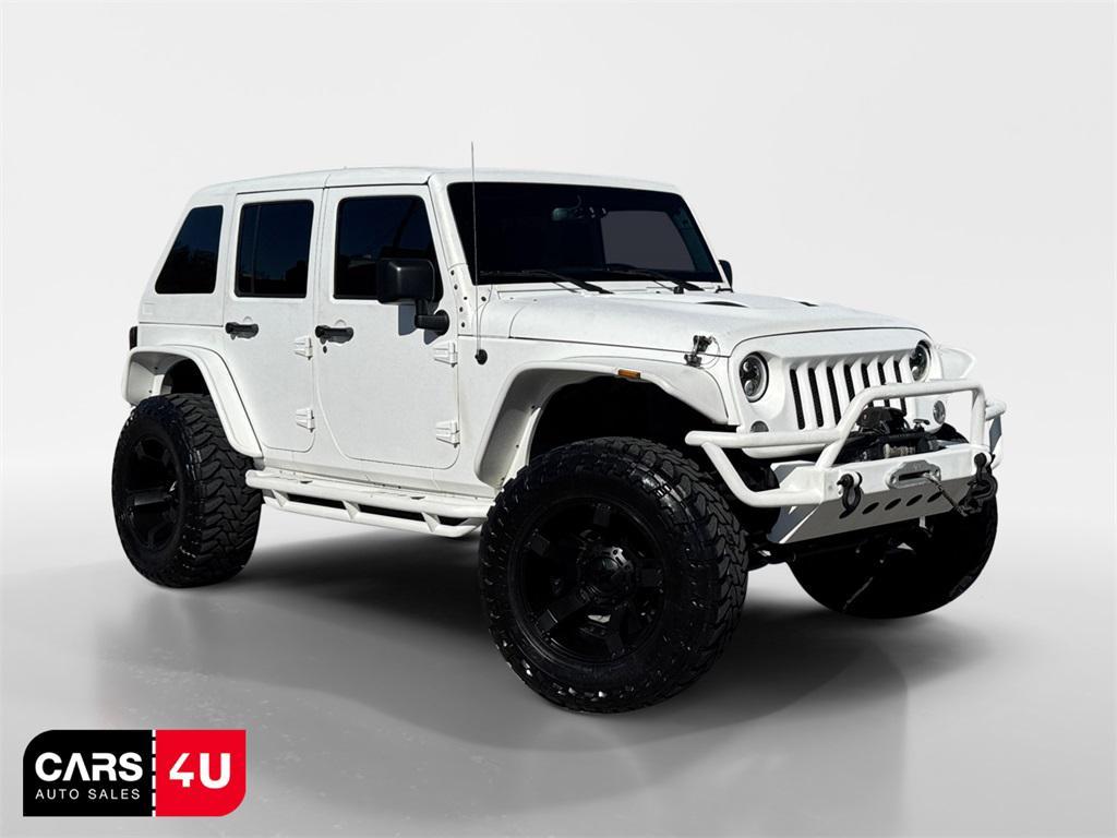 used 2015 Jeep Wrangler Unlimited car, priced at $20,922