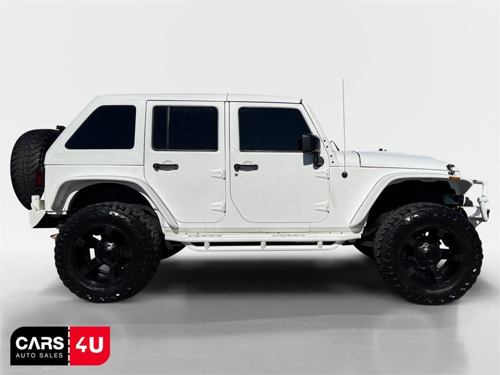 used 2015 Jeep Wrangler Unlimited car, priced at $20,922