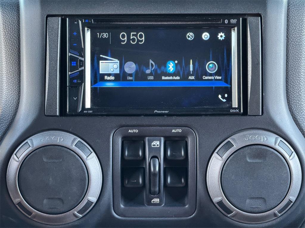 used 2015 Jeep Wrangler Unlimited car, priced at $20,922