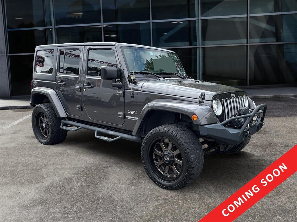 used 2017 Jeep Wrangler Unlimited car, priced at $21,188