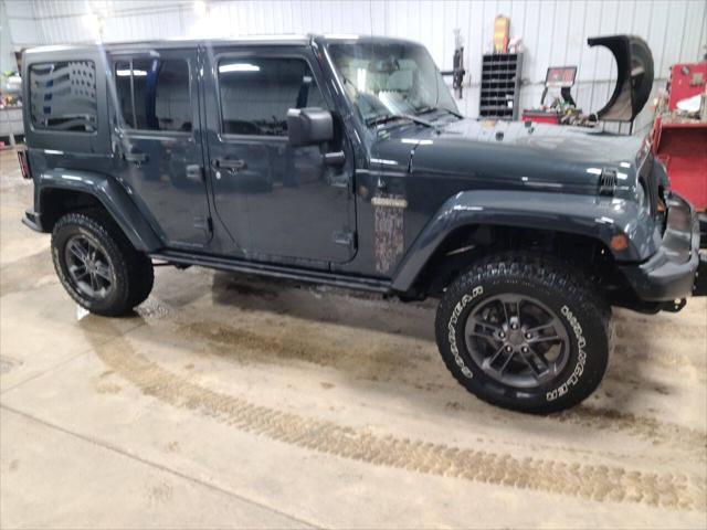 used 2018 Jeep Wrangler JK Unlimited car, priced at $19,999