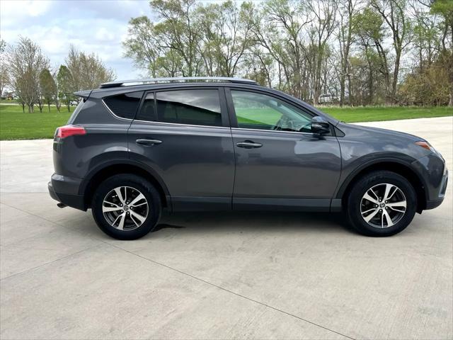 used 2018 Toyota RAV4 car, priced at $13,900
