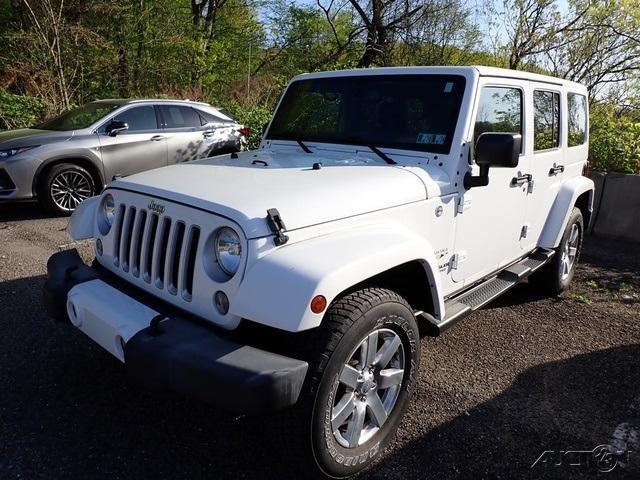 used 2016 Jeep Wrangler Unlimited car, priced at $23,956