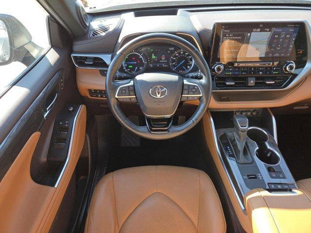used 2021 Toyota Highlander Hybrid car, priced at $30,428