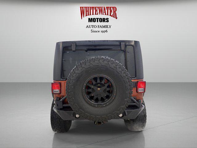 used 2014 Jeep Wrangler Unlimited car, priced at $19,995