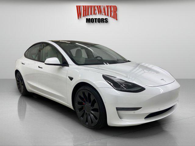 used 2022 Tesla Model 3 car, priced at $32,995