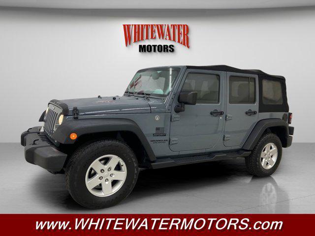 used 2014 Jeep Wrangler Unlimited car, priced at $13,995