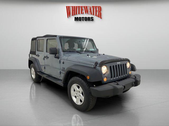 used 2014 Jeep Wrangler Unlimited car, priced at $13,995