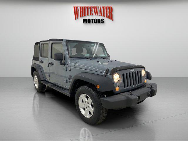 used 2014 Jeep Wrangler Unlimited car, priced at $13,995