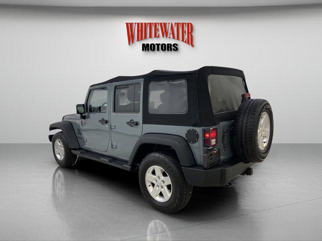 used 2014 Jeep Wrangler Unlimited car, priced at $13,995