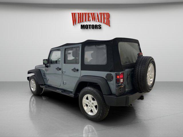 used 2014 Jeep Wrangler Unlimited car, priced at $13,995