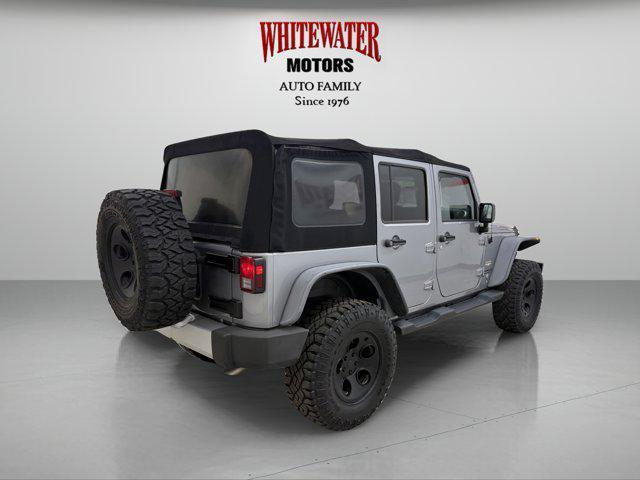 used 2014 Jeep Wrangler Unlimited car, priced at $17,995