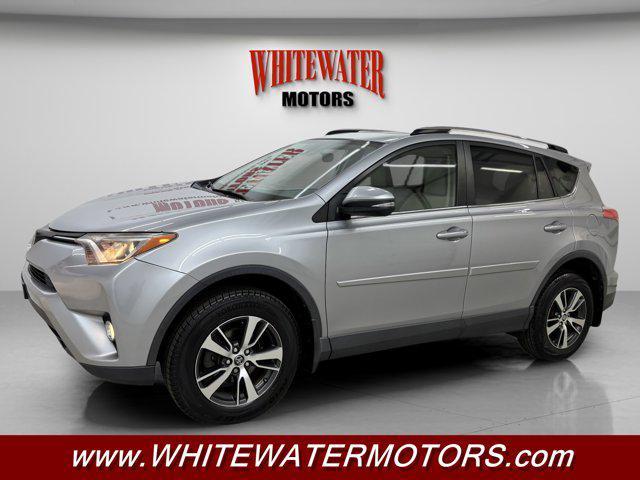 used 2018 Toyota RAV4 car, priced at $19,995