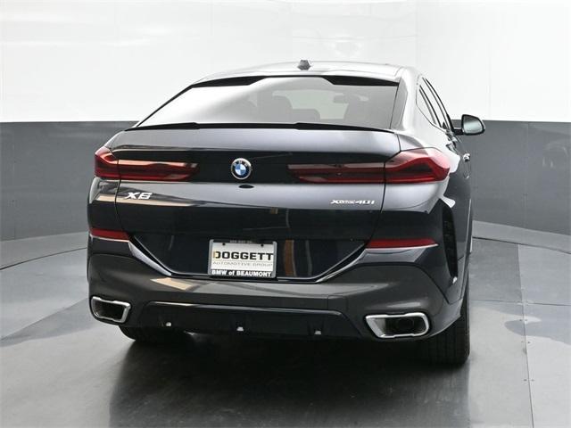 new 2025 BMW X6 car, priced at $77,875