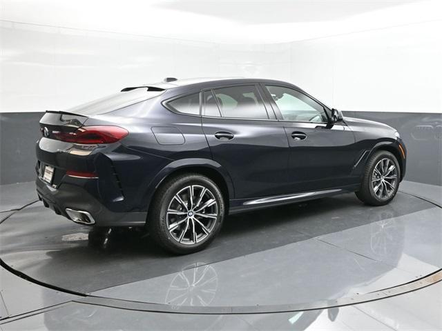 new 2025 BMW X6 car, priced at $77,875