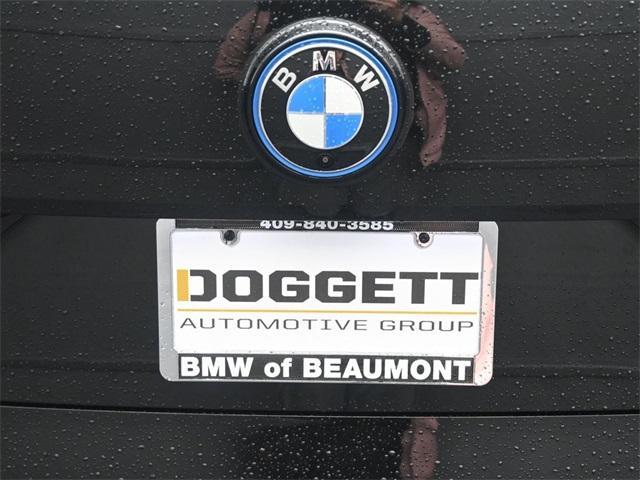 new 2025 BMW iX car, priced at $88,325