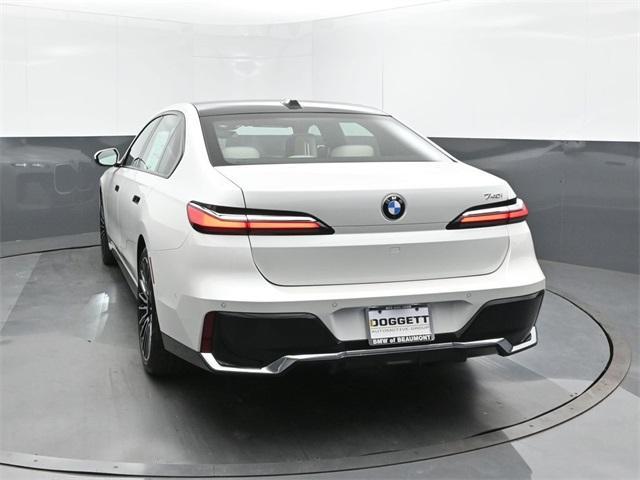 new 2025 BMW 740 car, priced at $117,675