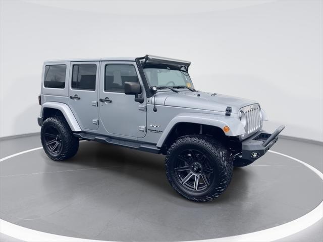 used 2016 Jeep Wrangler Unlimited car, priced at $22,912