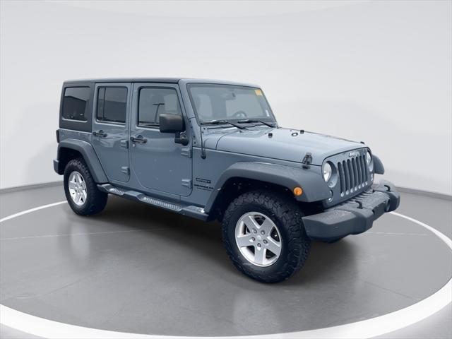 used 2014 Jeep Wrangler Unlimited car, priced at $19,550