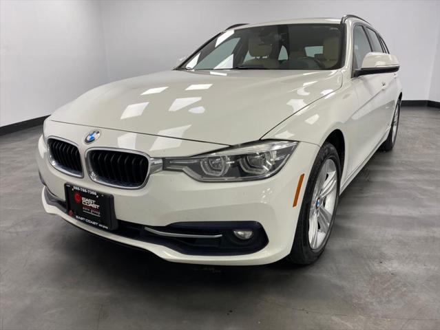 used 2018 BMW 330 car, priced at $18,789