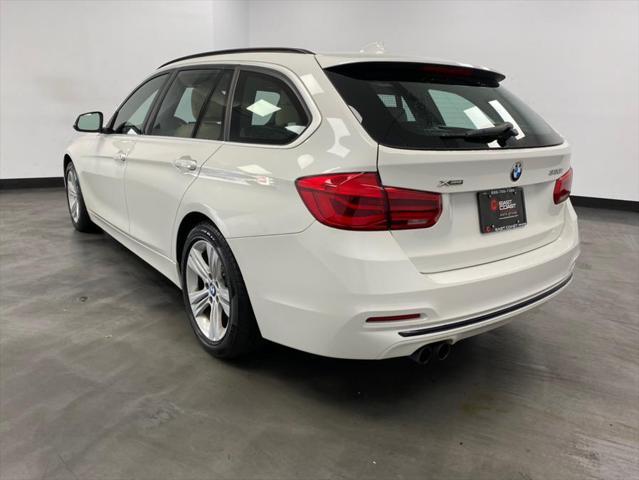 used 2018 BMW 330 car, priced at $18,789