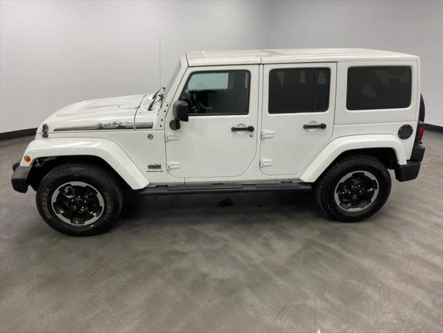 used 2014 Jeep Wrangler Unlimited car, priced at $19,912