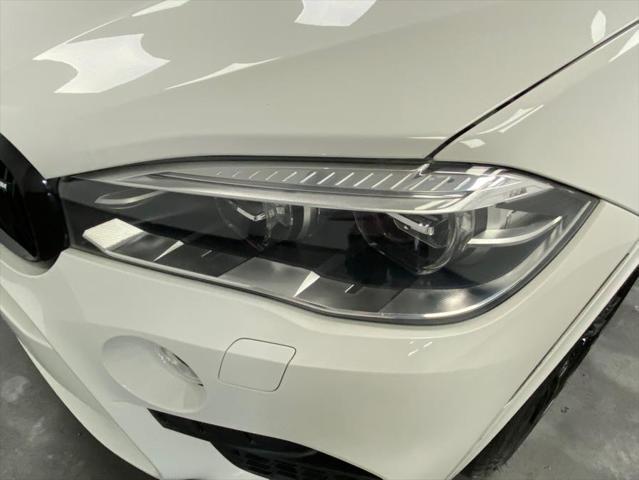 used 2018 BMW X5 M car, priced at $36,270