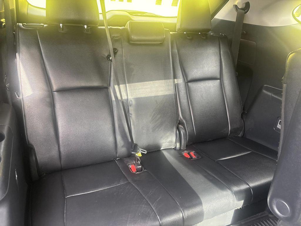 used 2024 Toyota Highlander Hybrid car, priced at $46,998