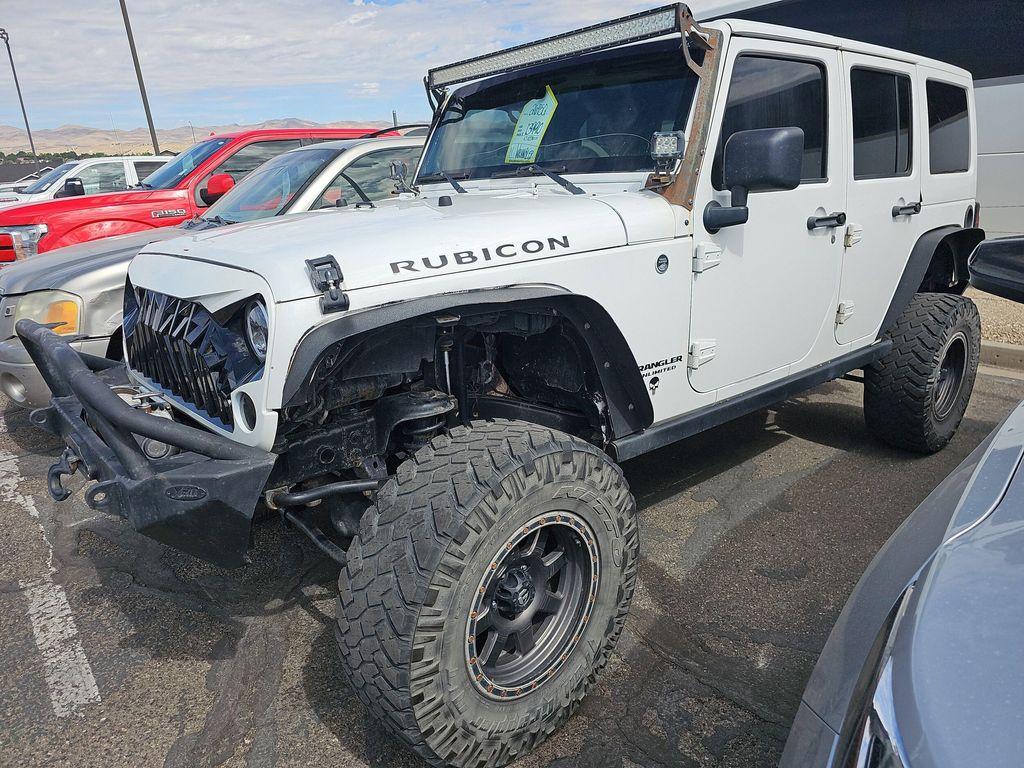 used 2011 Jeep Wrangler Unlimited car, priced at $13,990