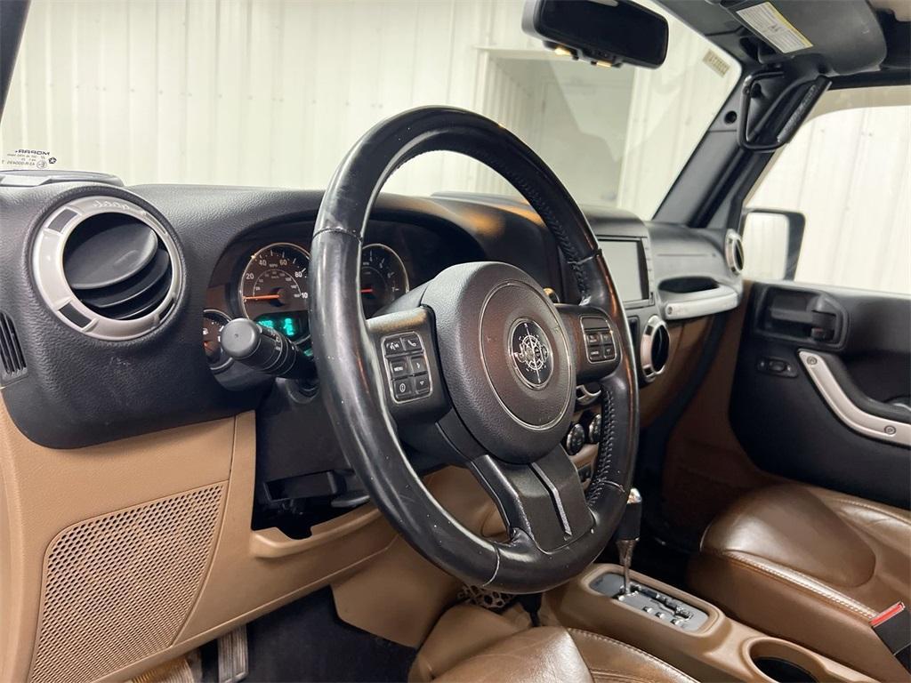 used 2015 Jeep Wrangler Unlimited car, priced at $19,587