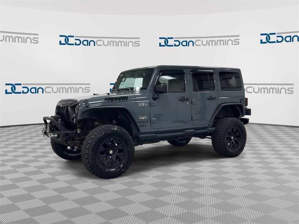 used 2015 Jeep Wrangler Unlimited car, priced at $19,587