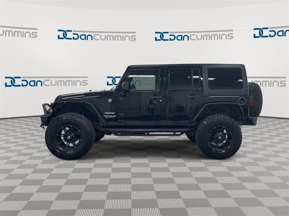 used 2014 Jeep Wrangler Unlimited car, priced at $23,987