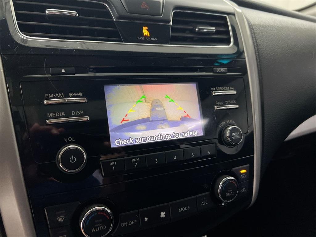 used 2014 Nissan Altima car, priced at $5,200