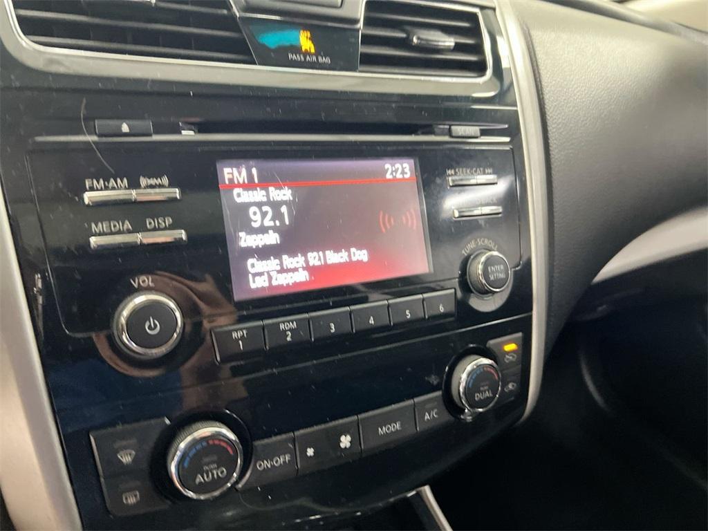 used 2014 Nissan Altima car, priced at $5,200