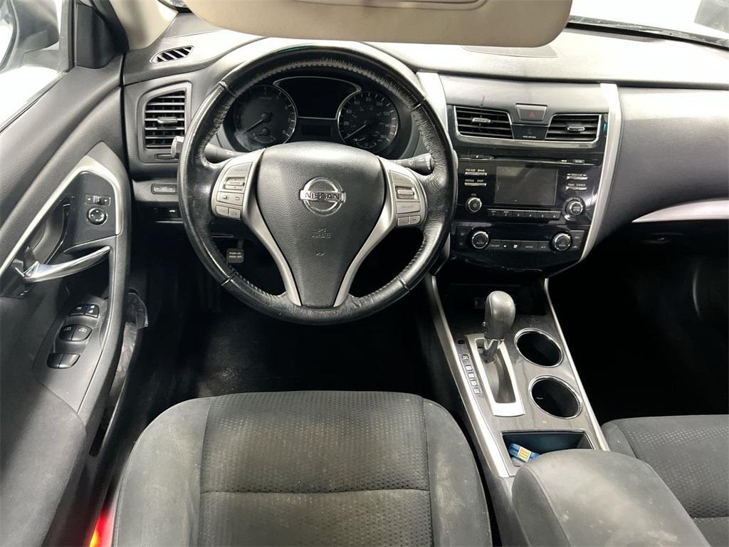 used 2014 Nissan Altima car, priced at $5,200