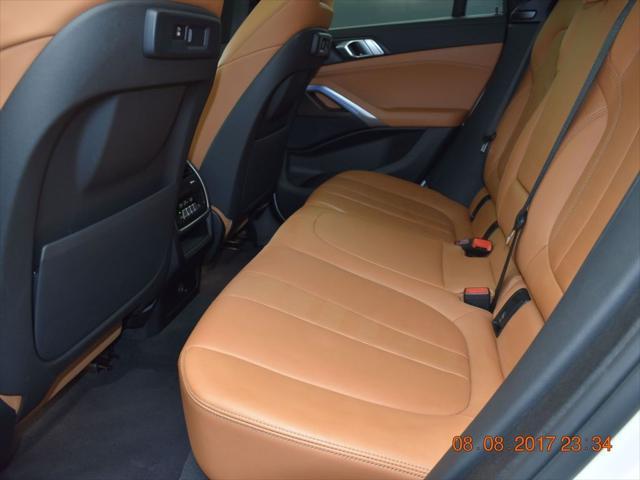 used 2022 BMW X6 car, priced at $52,350