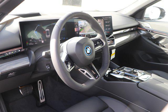 new 2026 BMW 550e car, priced at $81,175