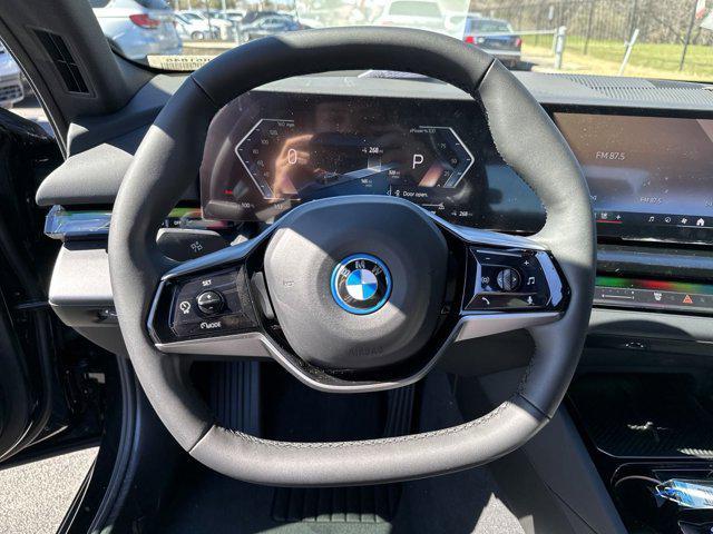 used 2024 BMW i5 car, priced at $54,947