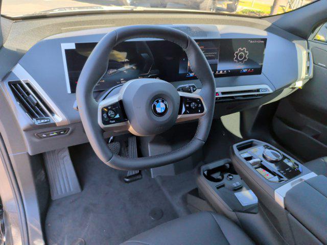 new 2026 BMW iX car, priced at $83,925