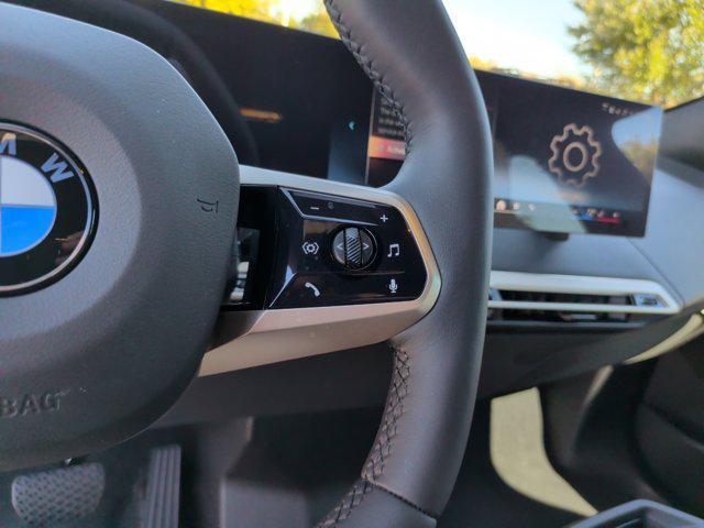 new 2026 BMW iX car, priced at $85,725