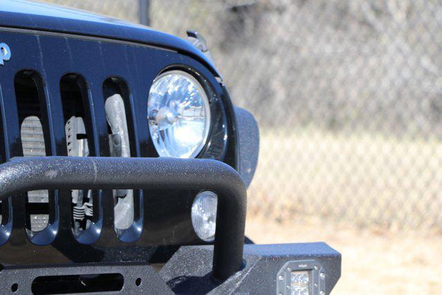 used 2015 Jeep Wrangler Unlimited car, priced at $18,915