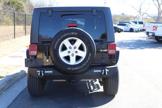 used 2015 Jeep Wrangler Unlimited car, priced at $18,915