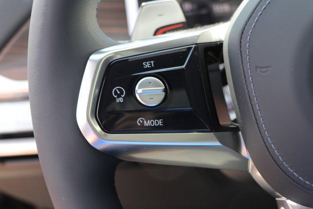 new 2025 BMW 740 car, priced at $112,275