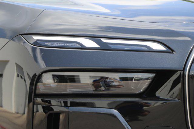 new 2025 BMW 740 car, priced at $112,275