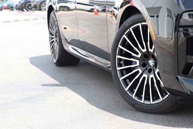 new 2025 BMW 740 car, priced at $112,275