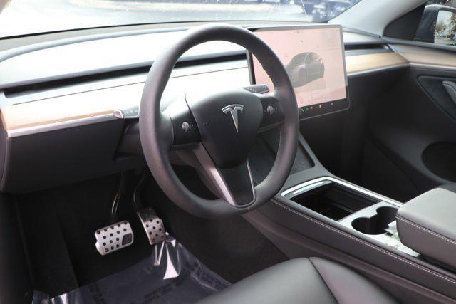 used 2024 Tesla Model Y car, priced at $38,491