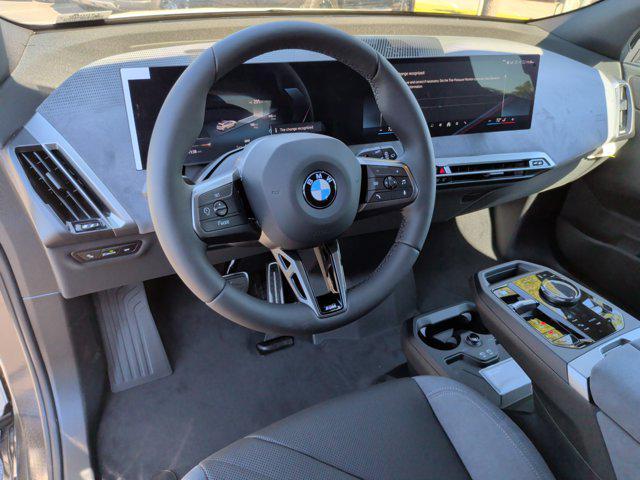 new 2026 BMW iX car, priced at $82,675