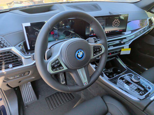 new 2026 BMW X5 PHEV car, priced at $92,925