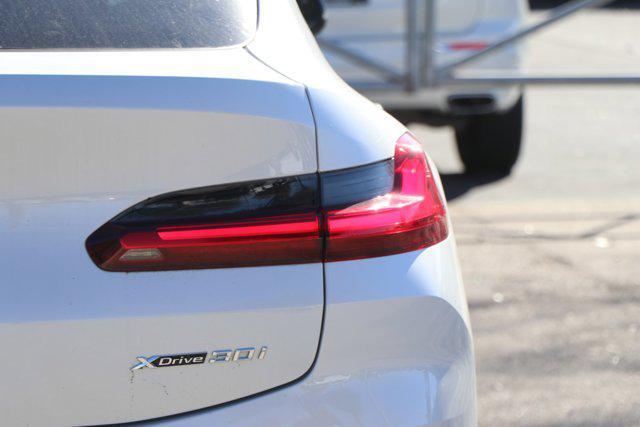 used 2022 BMW X4 car, priced at $42,991