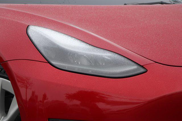 used 2022 Tesla Model 3 car, priced at $28,491